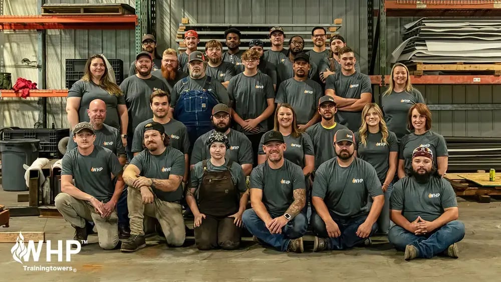 The WHP Trainingtowers team posed for a group photo within their national headquarters based in Grandview, MO.